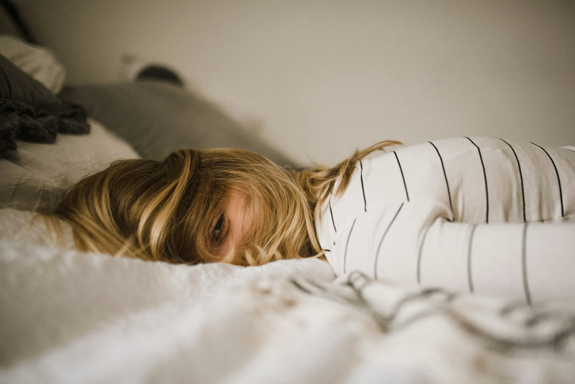 A woman lying in bed